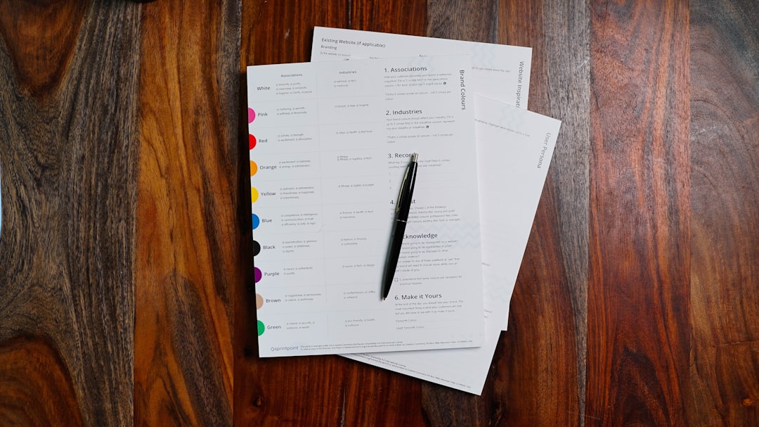 Insurance policy documents and pen on a table