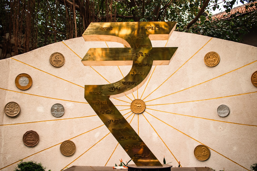 Indian rupee notes beside a home-loan calculator